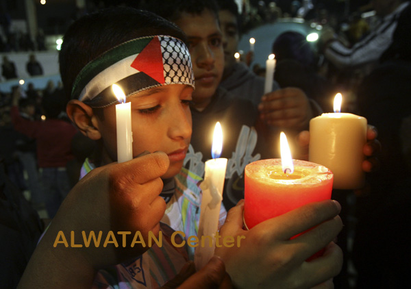 Febuary 14- 2009- Palestinian children light candle for Gaza Children peace during a rally in Hebron
